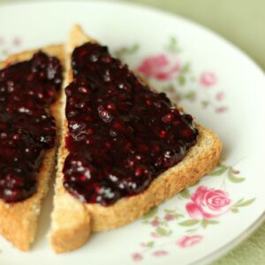 This Blackberry Jam is ready in 10 minutes without cooking or fuss. The sugar is adjustable for different diets and the results taste like fresh berries.