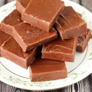 This wonderful, simple fudge is based off the original Kraft Fantasy Fudge recipe I grew up with. No candy thermometer needed. Perfect results every time.