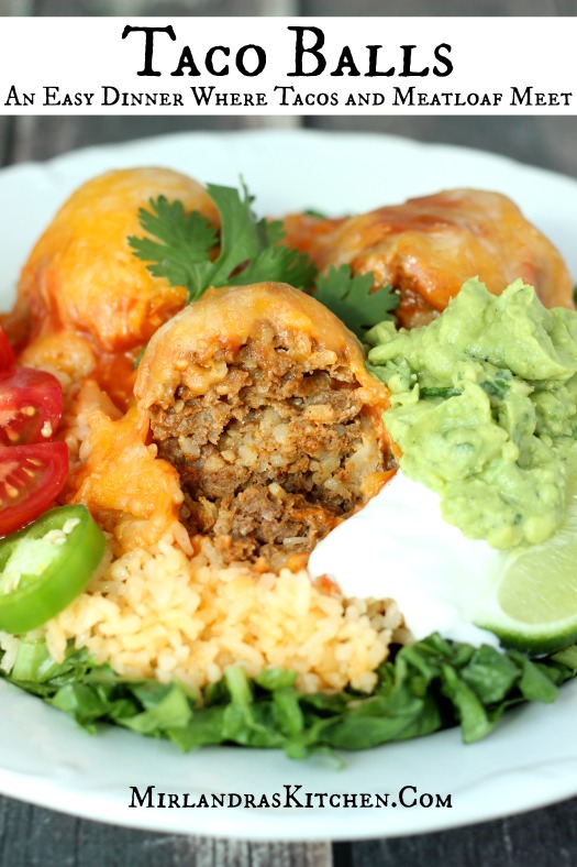 A white plate is covered with lettuce, rice and a big serving of taco balls. Cilantro, guacamole, and sour cream are garnish on the side.