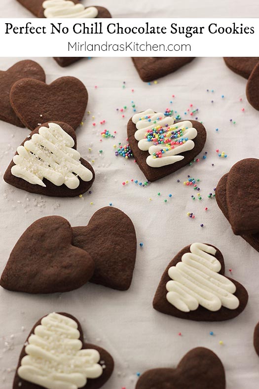 This is the easiest recipe for chocolate sugar cookies that exists! The dough does NOT have to be chilled and the cookies taste wonderful. These are cookies you can actually enjoy making with kids and I’ve included a great buttercream frosting recipe to decorate with!