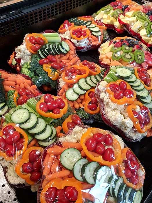 Elegant bowls of cut veggies ready to grab for snacks or a party at Albertsons on Broadway. 