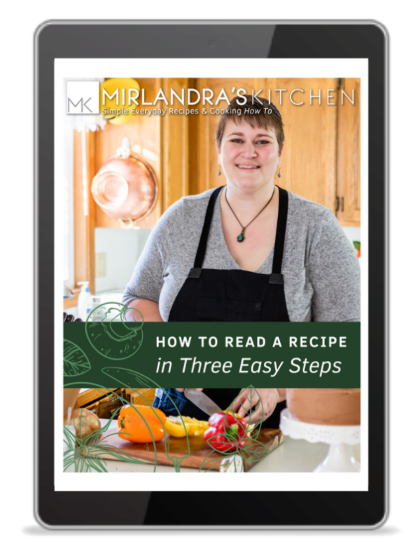 The cover of how to read a recipe free download displayed on a tablet. You can see the author, Mirlandra, cooking on the front cover.