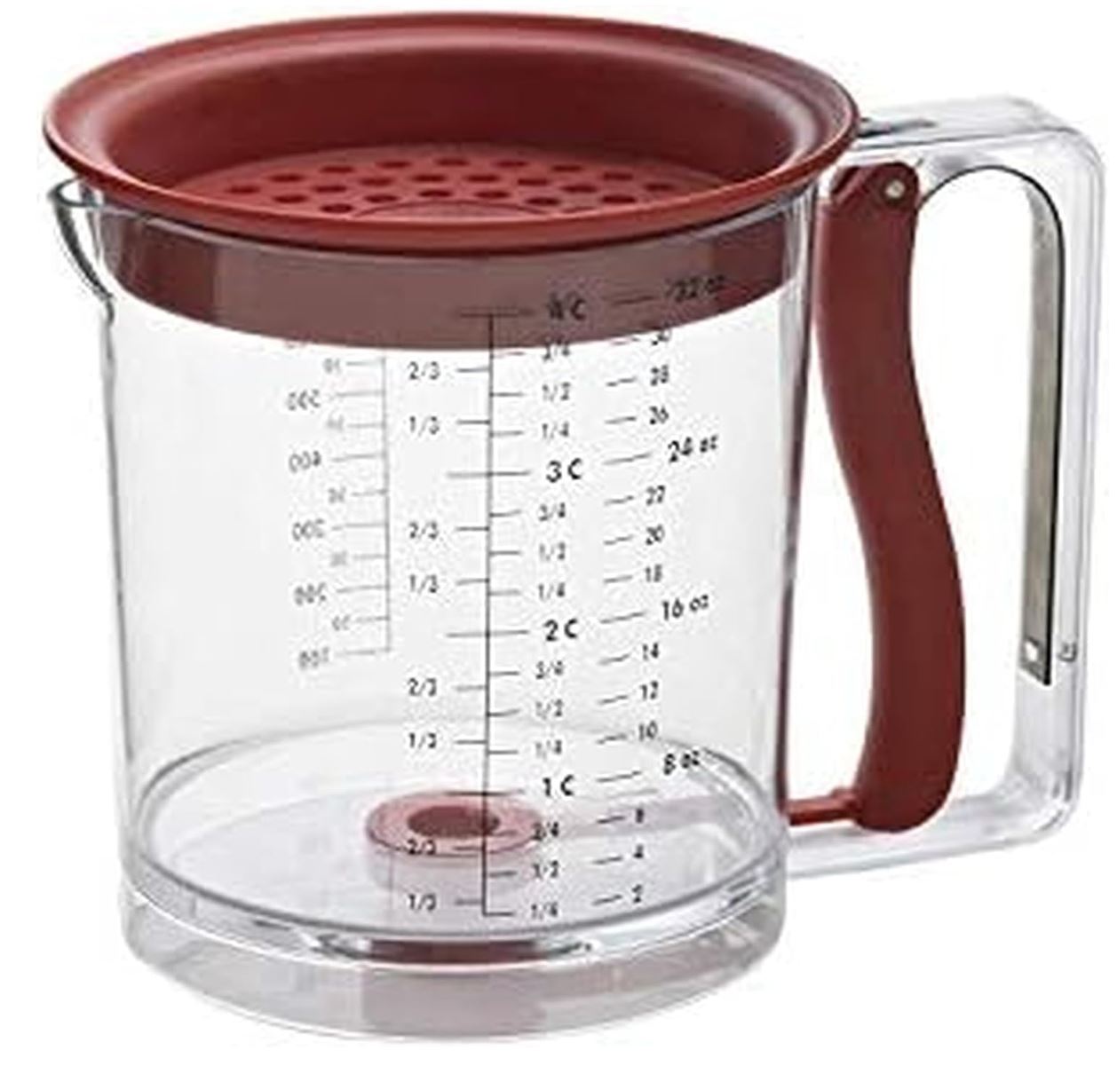 basic fat separator for making gravy sitting on the counter. 