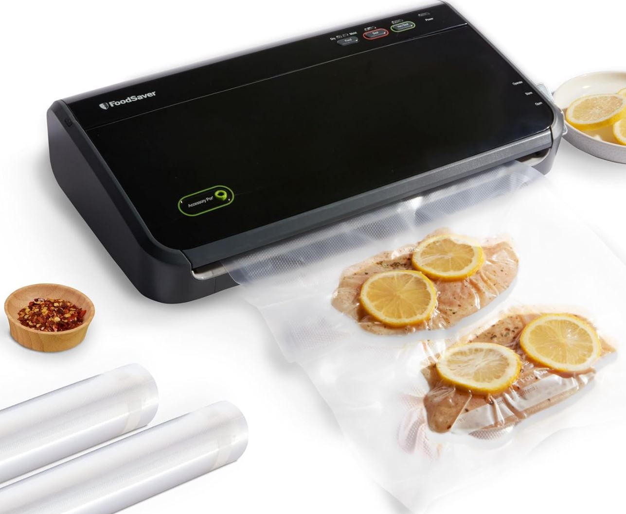 a food saver vacuum sealer portioning fish for the freezer. 