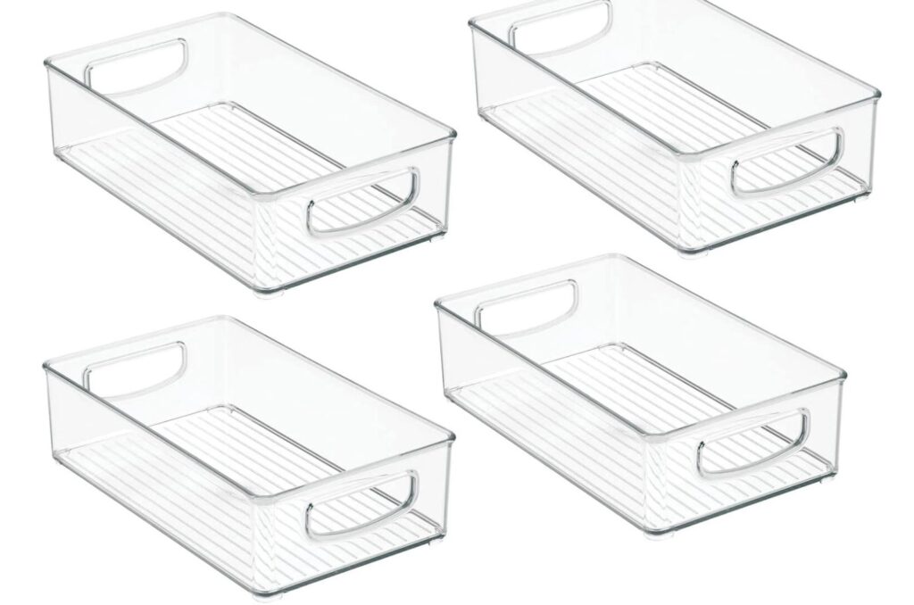 a set of four pantry storage bins, clear plastic