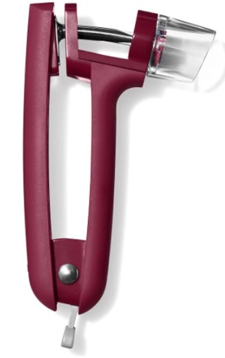 Cherry pitter with splatter guard. The guard is a nice berry color.